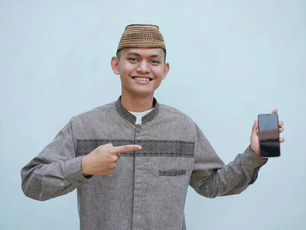 Portrait Young Asian Muslim Man Using Smartphone Happy Expression Pointing — Stock Photo, Image