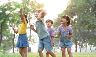 group image of cute asian children playing in the park
