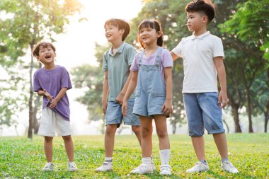 group image of cute asian children playing in the park