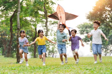 group image of cute asian children playing in the park
