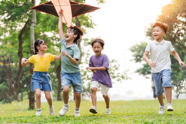 group image of cute asian children playing in the park clipart