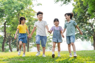 group image of asian children having fun in the park