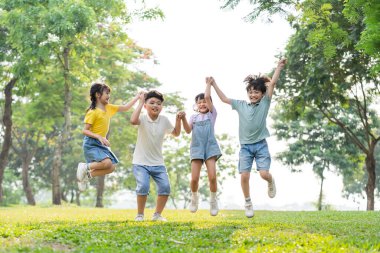 group image of asian children having fun in the park
