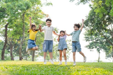 group image of asian children having fun in the park