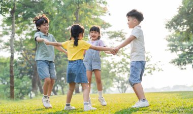 group image of asian children having fun in the park
