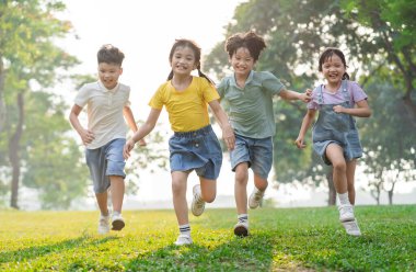 group image of asian children having fun in the park