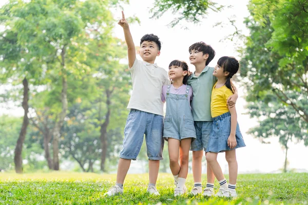 Group Cute Asian Kids Having Fun Park — стоковое фото