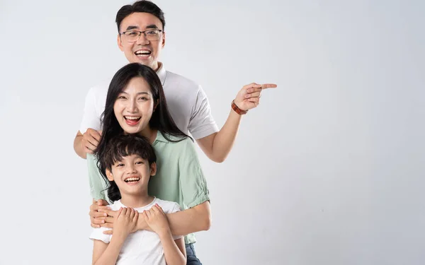 A family on a white background