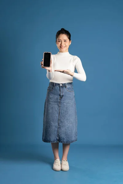 stock image Image of beautiful Asian woman posing on blue background