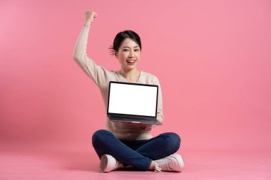 Image of beautiful Asian woman posing on a white background clipart