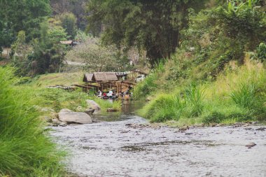 Stone and river at Utaradit, Thailand.