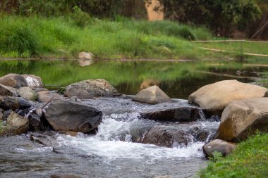 Stone and river at Utaradit, Thailand.