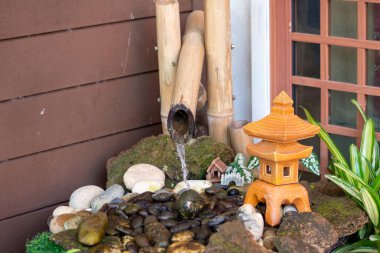Stone and water at Utaradit, Thailand.