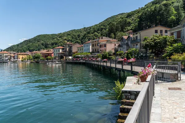 View of Porto Ceresio, a typical village located on the Italian side of Lugano Lake, Lombardy, Italy
