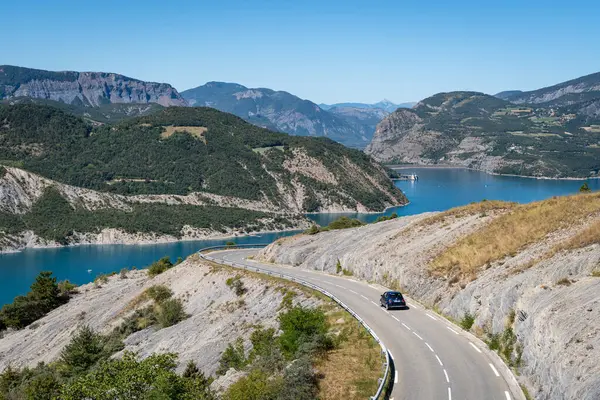 Scenic panoramic road overlooking the Lake of Serre-Poncon, Hautes-Alpes, France