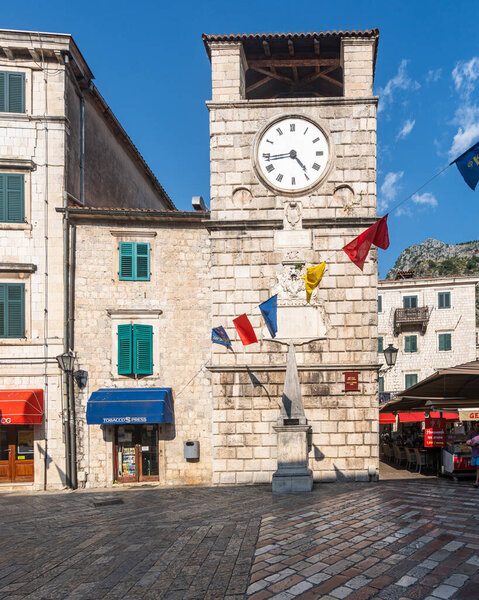 Kotor, Montenegro, Aug. 2023. A captivating view of a clock tower standing in the vibrant town square of Kotor Old Town