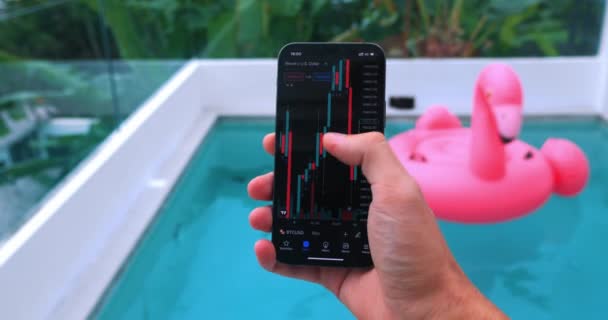 Successful Man Investor Using Smart Phone Checking Bitcoin Price Chart — Video