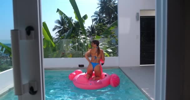 Young Tourist Woman Sunbathing Inflatable Pink Flamingo Small Private Swimming — Video