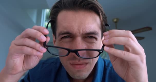 Portrait Young Male Put Glasses See Better Indoors Close Male — Stockvideo