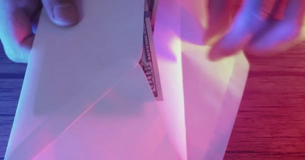 Criminal Opens Envelope Counts Cash Dollars Close Neon Light Bribe — Αρχείο Βίντεο