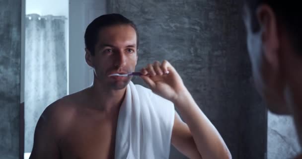 Close Young Millennial Bare Male Brushing Teeth Toothbrush Bathroom Morning — Vídeo de stock