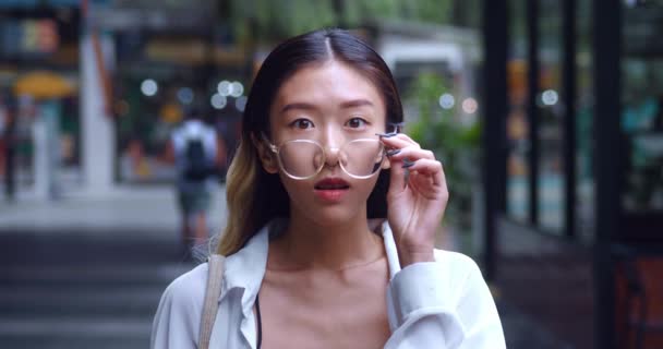 Surprised Young Asian Woman Takes Glasses Looking Camera Open Eyed — Vídeo de Stock