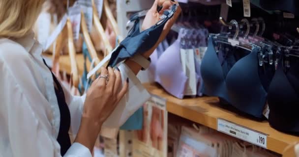 Young Woman Choosing Underwear Clothing Store Asian Woman Choosing Bra — Video