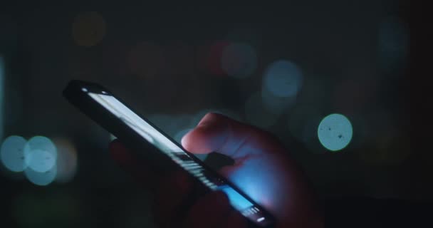 Close Person Use Smartphone Night Time Urban City Light Background — Stock Video