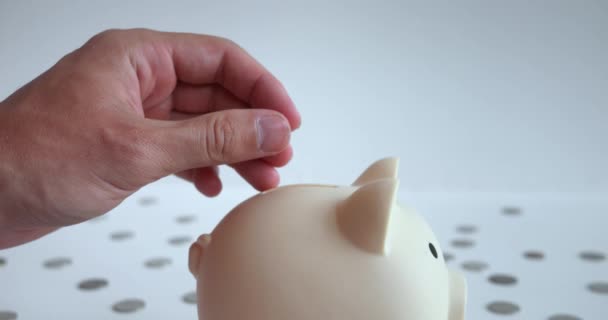 Close Hand Confidently Throwing Coin Pig Shaped Piggy Bank Koin — Stok Video