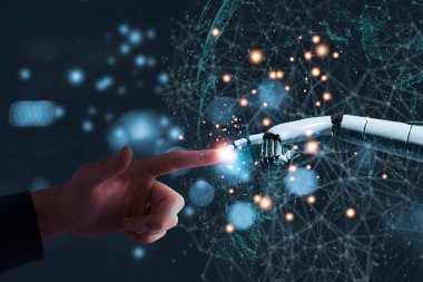 Bir insan parmağı ve robot parmağı, insan-yapay zeka etkileşimini sembolize eden, dijital bağlantılardan oluşan parlak bir ağın ortasında birleşir.