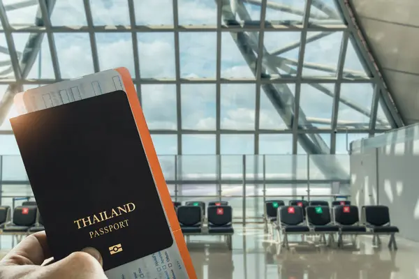 Close Traveler Hand Holding Thai Passport Bright Airport Terminal Empty — Stock Photo, Image