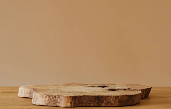 stock image Wooden slice on wooden table and copy space