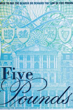 Kağıt banknotların klasik unsurları. Tasarım amaçlı 5 pound 'luk banknot. İngiltere için iş ve hisse senedi konsepti.