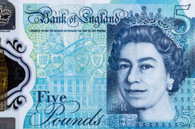 Kağıt banknotların klasik unsurları. Tasarım amaçlı 5 pound 'luk banknot. İngiltere için iş ve hisse senedi konsepti.