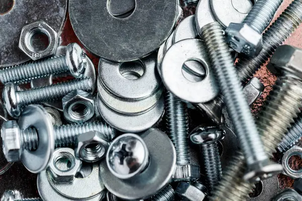 stock image Mixed screws and nails. Industrial background. Home improvement.bolts and nuts.Close-up of various screws. Use for background, top view.