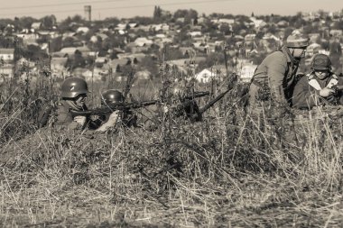 19 October 2008, Kiev, Ukraine.Demonstration of fights, historical reconstruction of a combat II. world War.Wehrmacht - german army soldiers and machinery. clipart