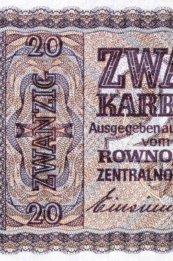 Eski kağıt banknotların eski parçaları. Ukrayna 'nın eski 20 karbovanez senedi. 1942 'de Alman İmparatorluğu' nun parasını işgal eden Rovno