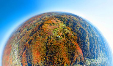 The Sokilsky ridge in the Carpathians is especially beautiful in autumn. its ancient cliffs among beech and birch forests are mesmerizing from a bird's eye view 360 circular panorama clipart