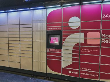 Loriol sur Drome, France - January 14, 2023: Lockers Mondial Relay. Pickup box a place by the road to send and receive parcels yourself. Mondial Relay is a French company providing postal services.