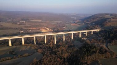 Panoramic drone view of the railway viaduct for high-speed trains. Overlooking the surrounding mountains in southern France