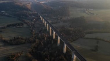 Panoramic drone view of the railway viaduct for high-speed trains. Overlooking the surrounding mountains in southern France