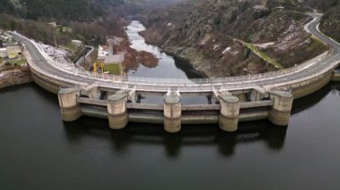 Panoramic drone view of The Grangent dam on the Loire river. Built between 1955 and 1957. Is located downstream of Aurec sur Loire in the surroundings of Saint-Etienne.