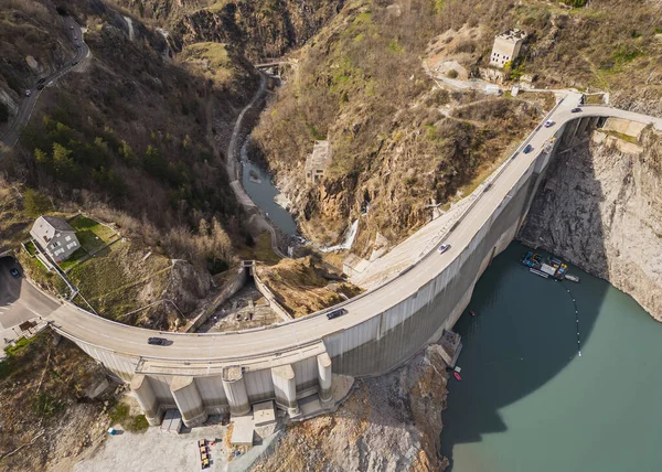 stock image Panoramic drone shot of a water dam on Lac Chambon in French Alps