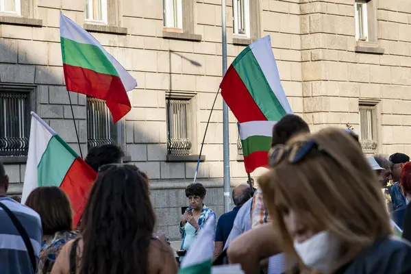 stock image Sofia, Bulgaria - 22 September 2020 : Demonstrators waving the Bulgarian flag during the 76-th day of anti-government protests against corrupt politicians. High quality photo