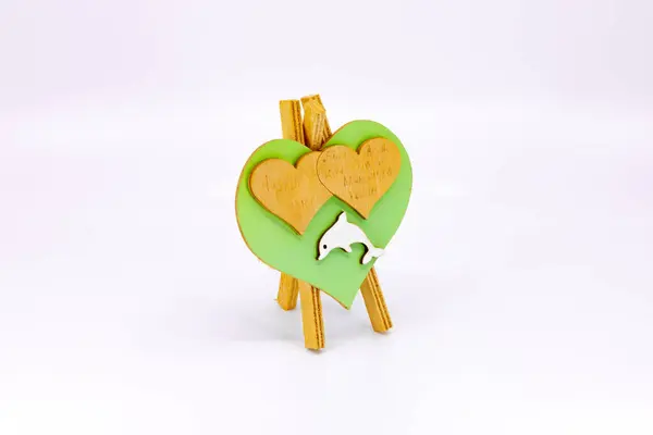 stock image Handcrafted Wooden Heart Decoration with Dolphin Motif