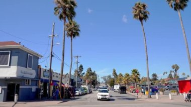 Beautiful summer day in Santa Cruz. People walking down the broadway in Santa Cruz enjoying warm summer days.