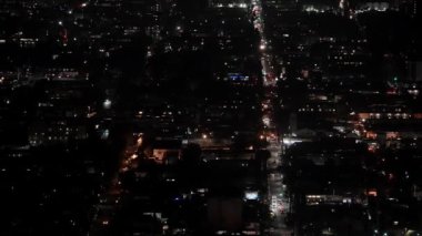 Beautiful aerial night view of the down town in Los Angeles, USA. Heavy traffic across the city in LA. 