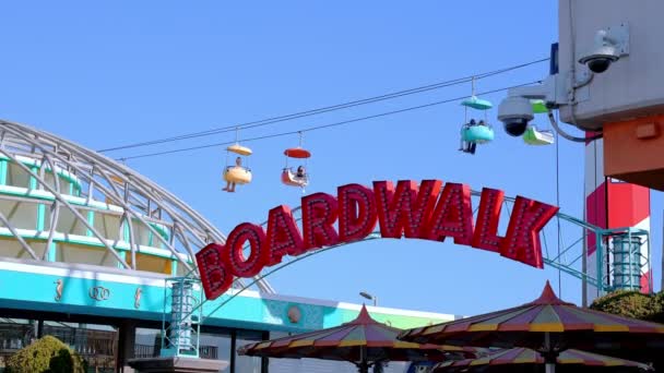 Low Angle View Red Boardwalk Text Entrance Amusement Park Santa — Stockvideo