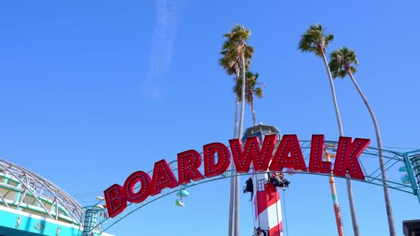 Low Angle View Red Boardwalk Text Entrance Amusement Park Santa — Stock video