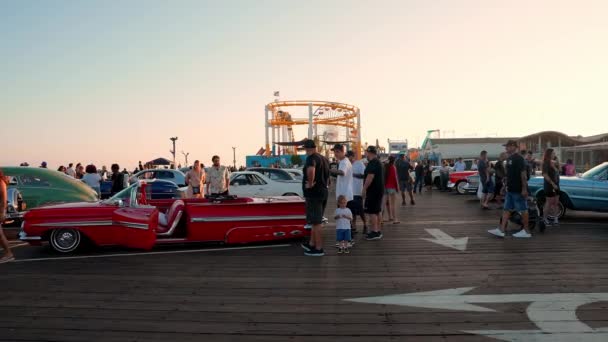 People Exploring Vintage Shiny Convertible Car Displayed Classic Car Show — Stockvideo